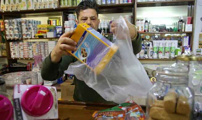 Greece charges for plastic carrier bag use at supermarkets