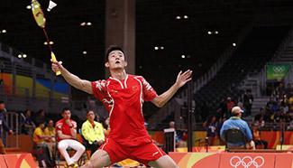 China's Chen Long wins 2-0 during men's singles group play stage match of Badminton