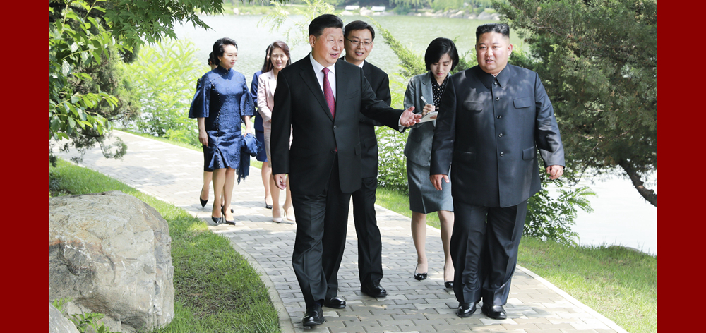 习近平会见朝鲜劳动党委员长、国务委员会委员长金正恩